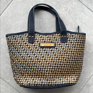 Denim and straw purse